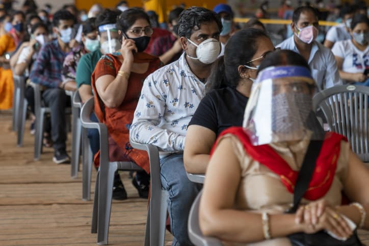 People waiting in line to get vaccinated