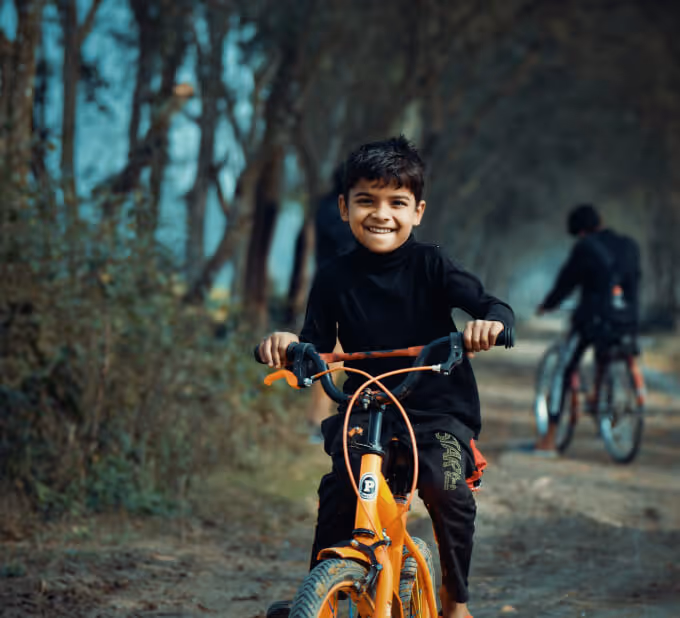 Kid riding a bicycle