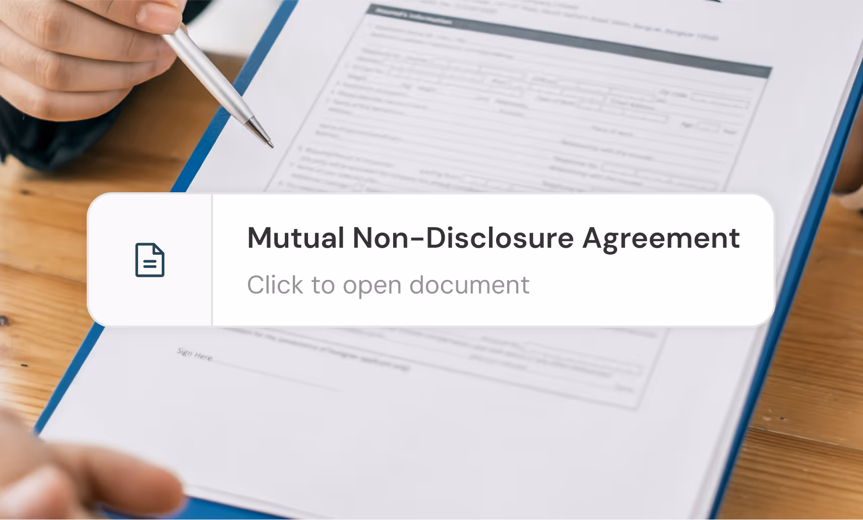 Contract on a desk with an Inhouse document card: Mutual Non-Disclosure Agreement