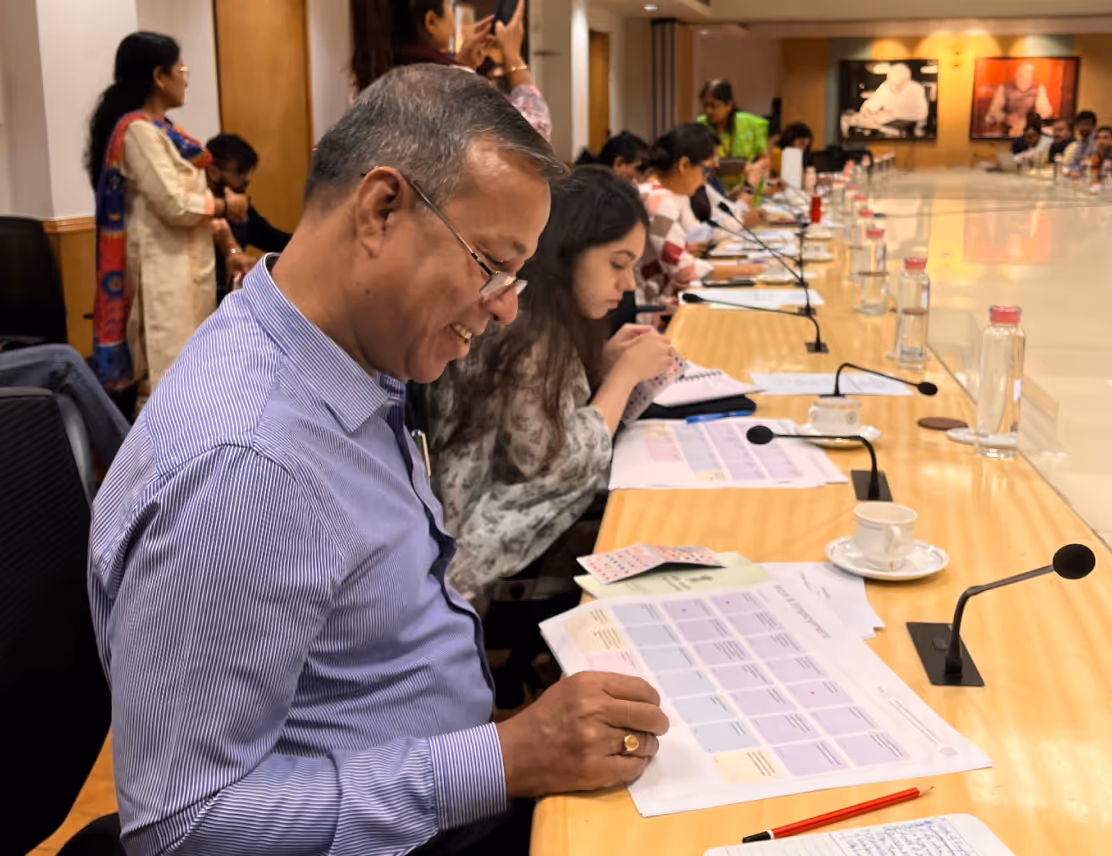 Experts reviewing data indicators at a curation workshop