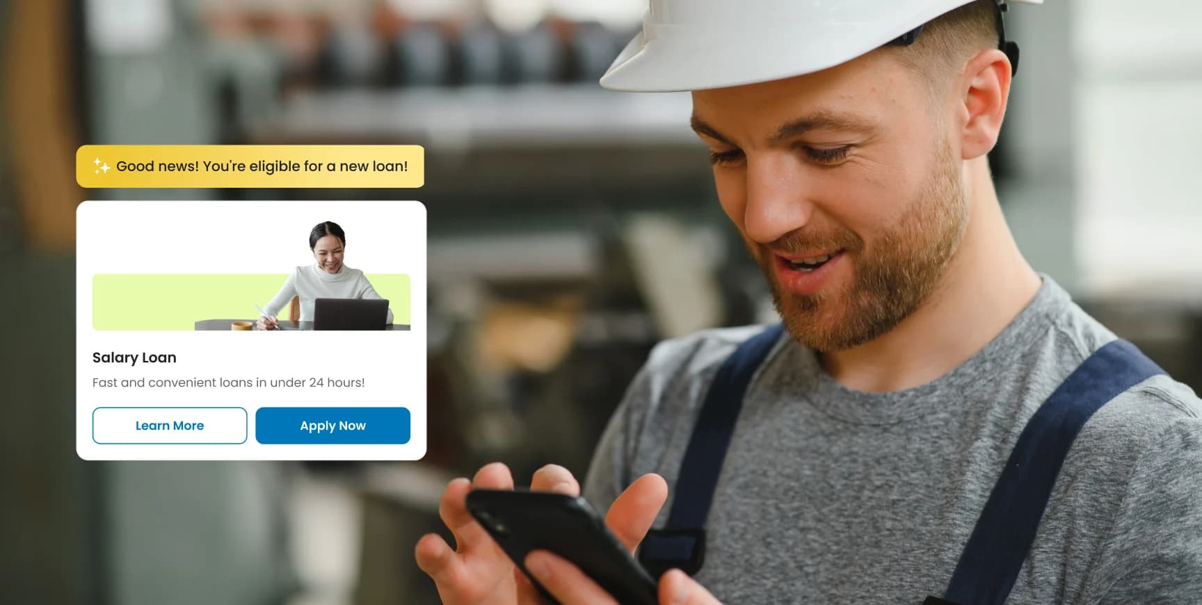 Worker on his phone with a new-loan eligibility card
