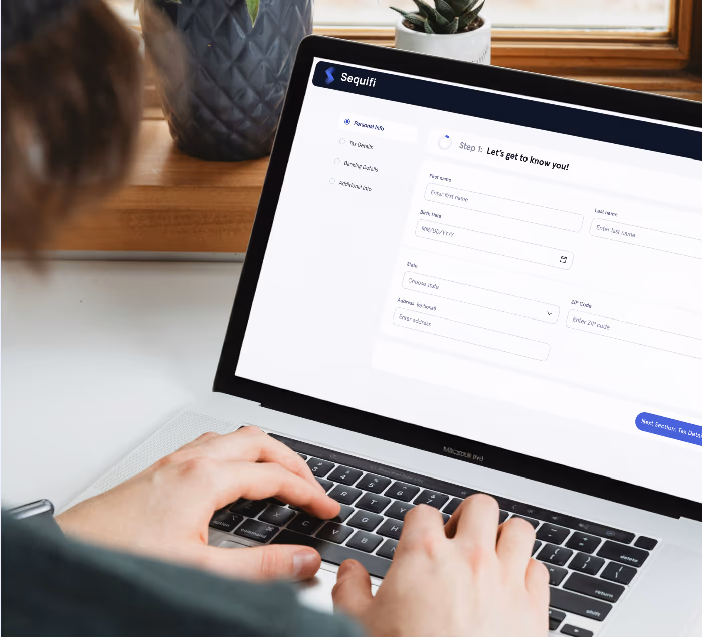 Sequifi onboarding on a laptop
