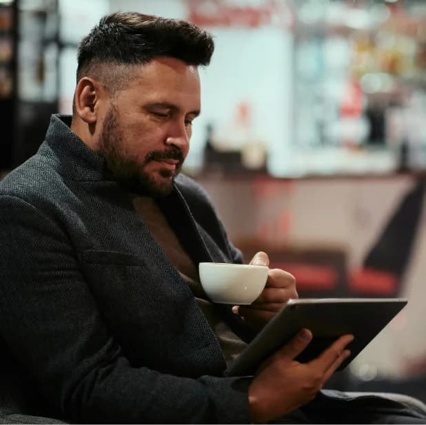 Consultant reviewing work on a tablet