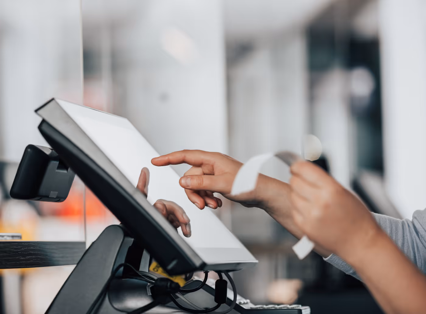 Restaurant staff using a point-of-sale terminal