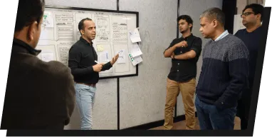 Image of robin discuss designs with client